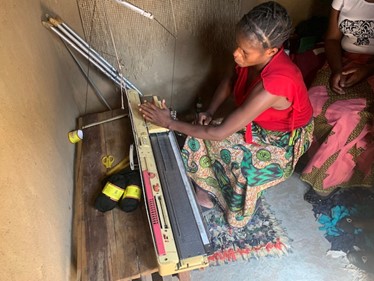 Lynn with knitting machine