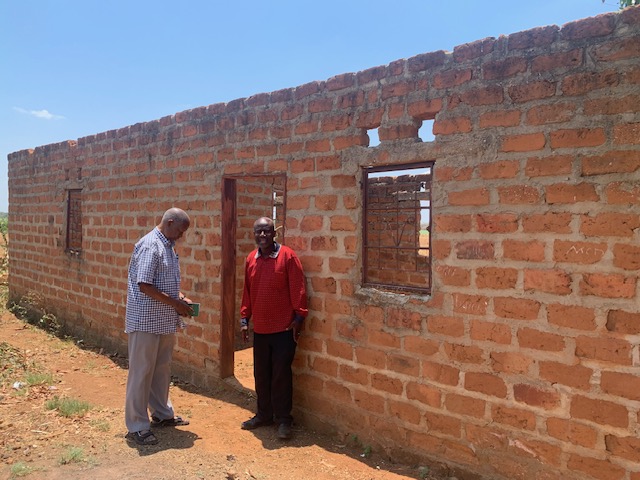 Could this building be completed with our funding for teacher at__ Nanga