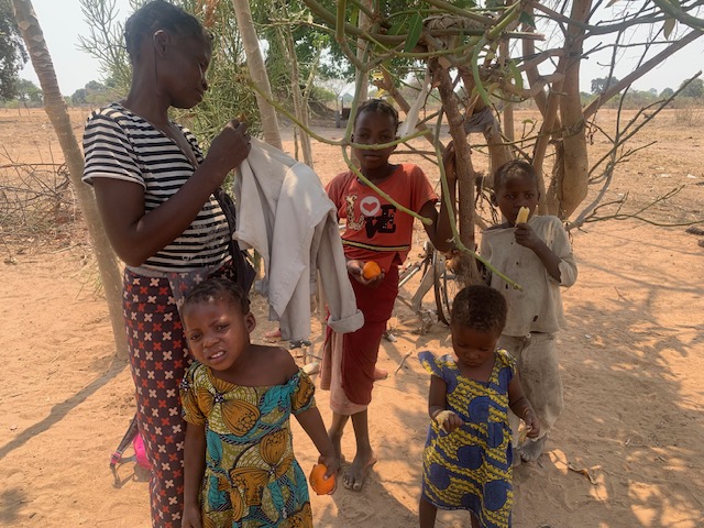 Kazolo nieces and nephews with fruit