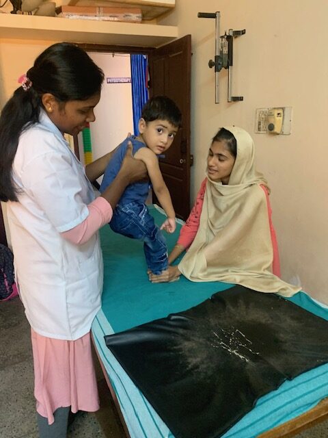 Angel giving Ishal physio