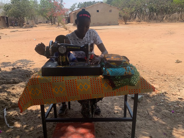 Abigail busy at her machine