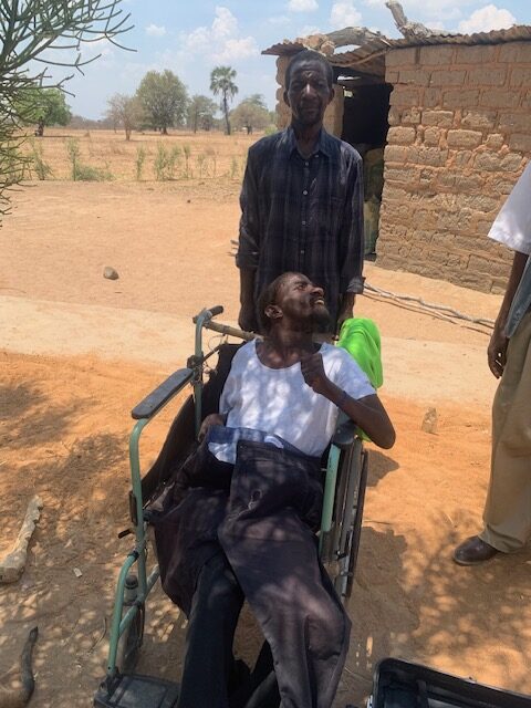 Kazolo with his brother -new clothes