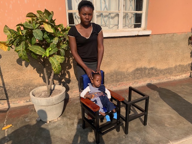 Kingsley and Mum trying out new seating