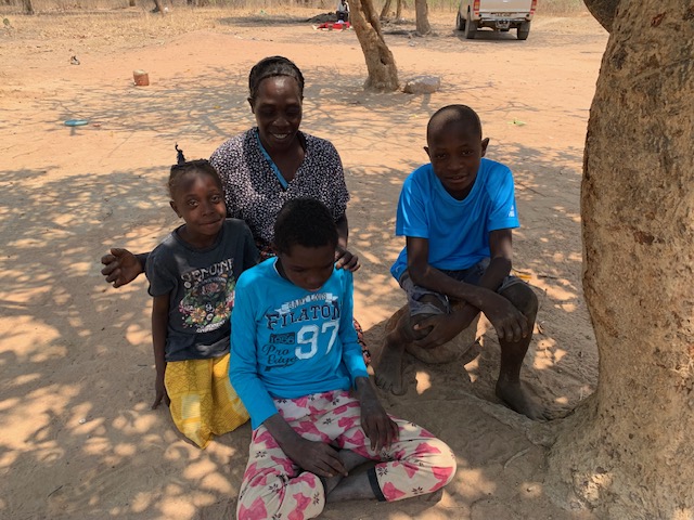 Mrs Dimuna and children with new clothes