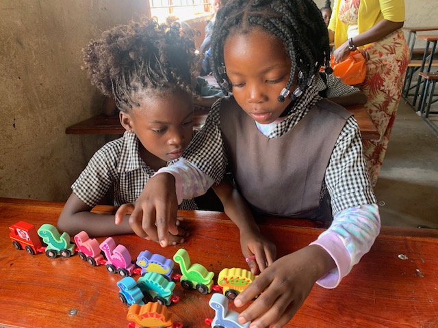 Muumba early years children with new learning materials