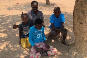 Mrs Dimuna and children with new clothes